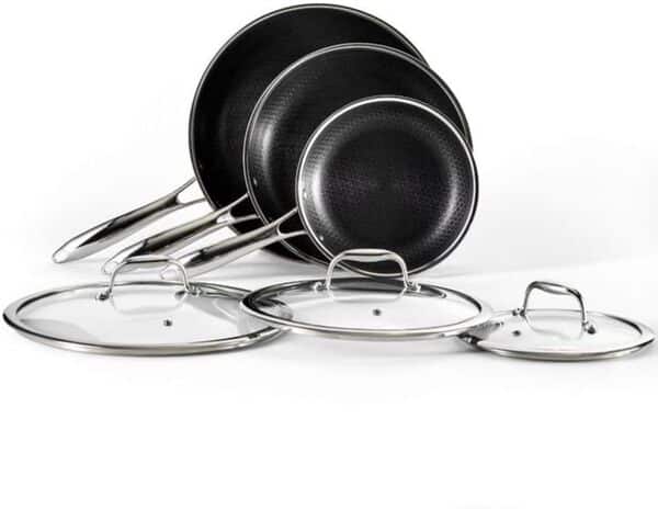 HexClad Batterie de cuisine hybride en acier inoxydable 7 pièces avec couvercles et wok – Ustensile en métal et passe au lave-vaisselle, prêt pour l'induction, sans PFOA, poêle antiadhésive facile
