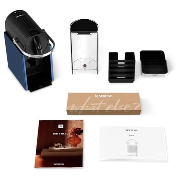 Découvrez le test complet de la cafetière espresso Magimix Nespresso 11328 bleu nuit : performance, design et conseils d'utilisation pour les amateurs de café